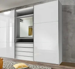Armoire à portes coulissantes avec miroir pivotant intégré MAGIC GLAS